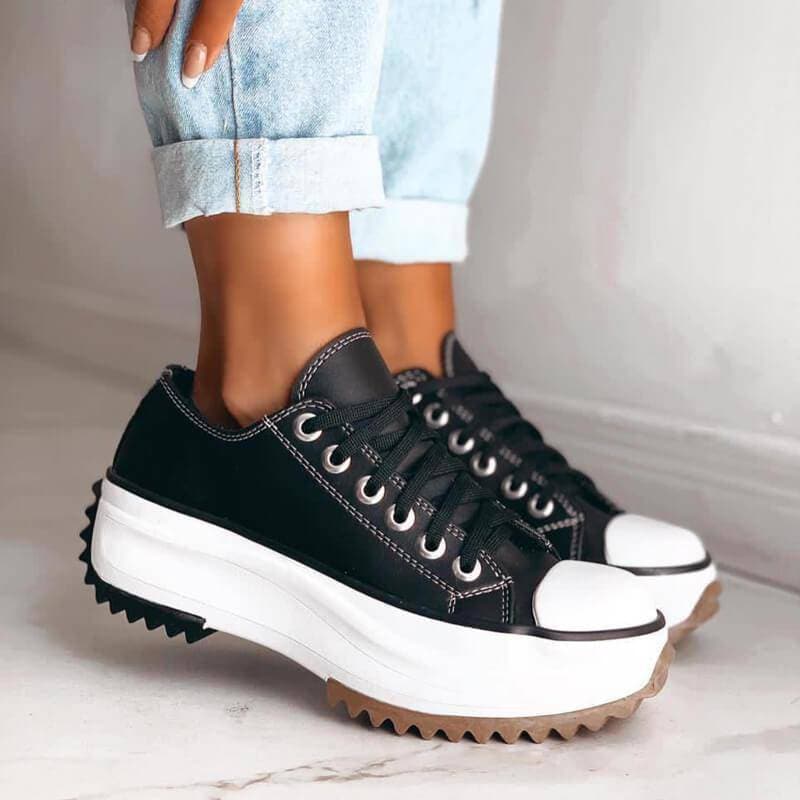 Baskets tendances en Noir avec design audacieux et semelle discrète