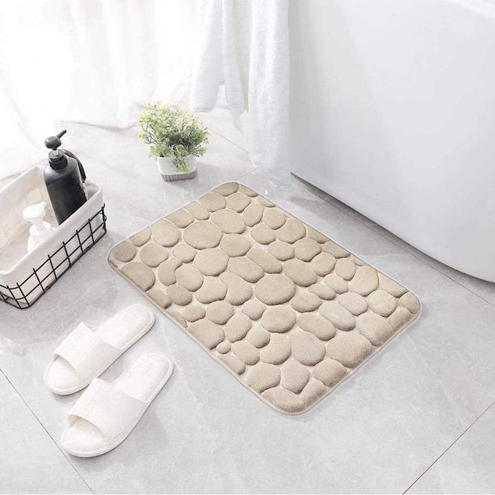 Tapis de bain antidérapant absorbant l'eau en beige pour une ambiance chaleureuse