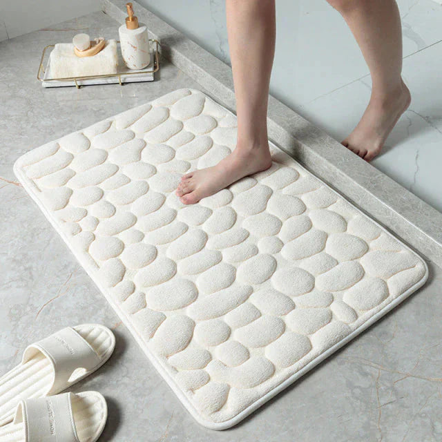 Tapis de bain antidérapant absorbant l'eau en blanc pour une élégance épurée dog