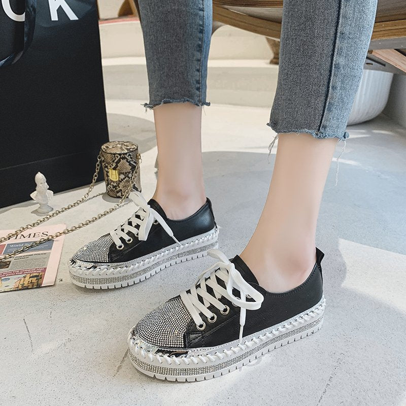 Baskets en cuir noir avec détails en diamant pour un look chic et moderne tra