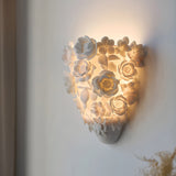 Lampe murale à fleurs en céramique