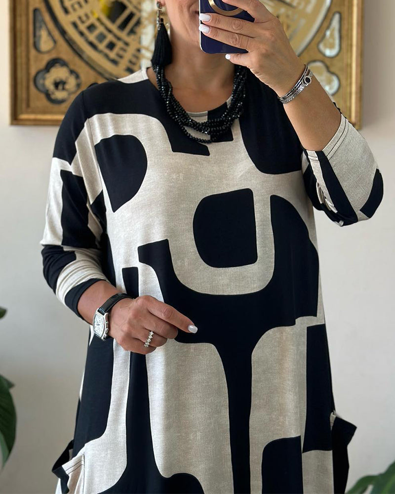 Robe élégante avec manches longues et col rond desig