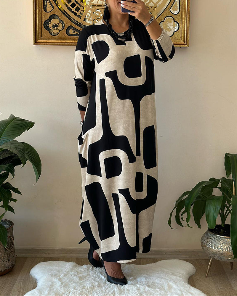 Robe élégante avec manches longues et col rond desig