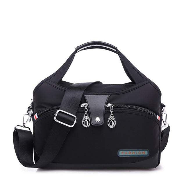 Sac à main WanderChic noir avec protection antivol et style élégant pour femmes d
